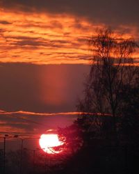 Scenic view of dramatic sky at sunset