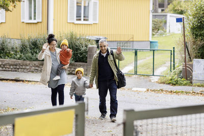 Parents walking with children