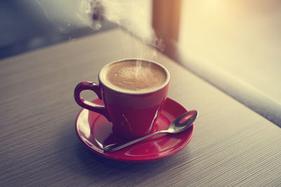 Close-up of coffee cup on table