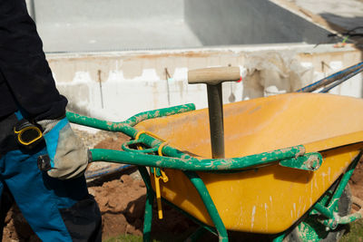 Rear view of man working at construction site