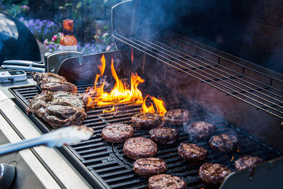 Close-up of meat on barbecue grill