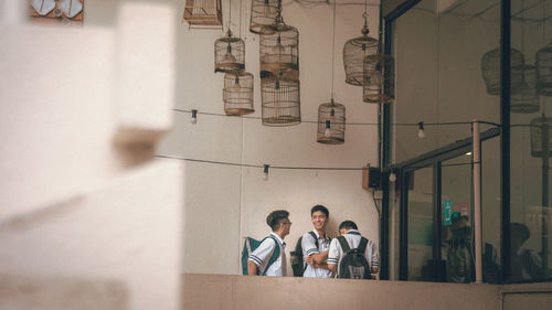 Group of people on wall