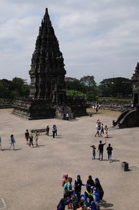 Group of people in front of historical building