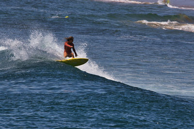 Man surfing in sea