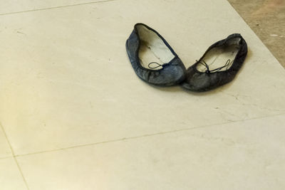 Pair of shoes on tiled floor