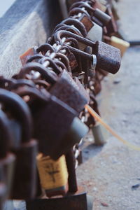 Close-up of chain tied up of metal