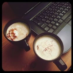 Close-up of coffee cup on table