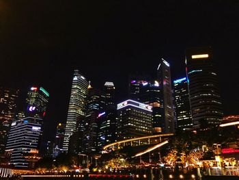 Low angle view of illuminated city at night