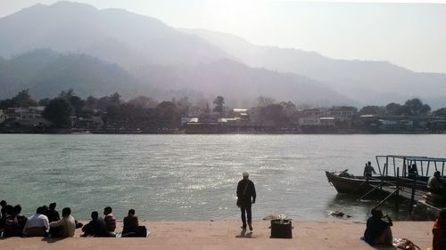 People relaxing at beach
