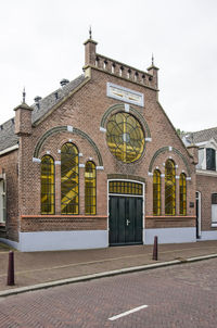 Exterior of historic building against sky