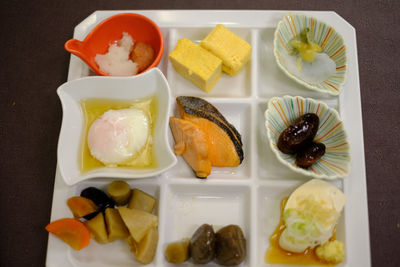 High angle view of fish served on table