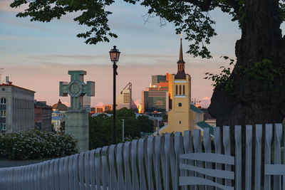 Buildings against sky during sunset