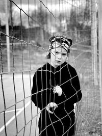 Portrait of young man standing outdoors