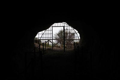 Abandoned building seen through window