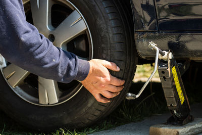 Man working in car