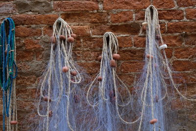 Close-up of clothes hanging on wall