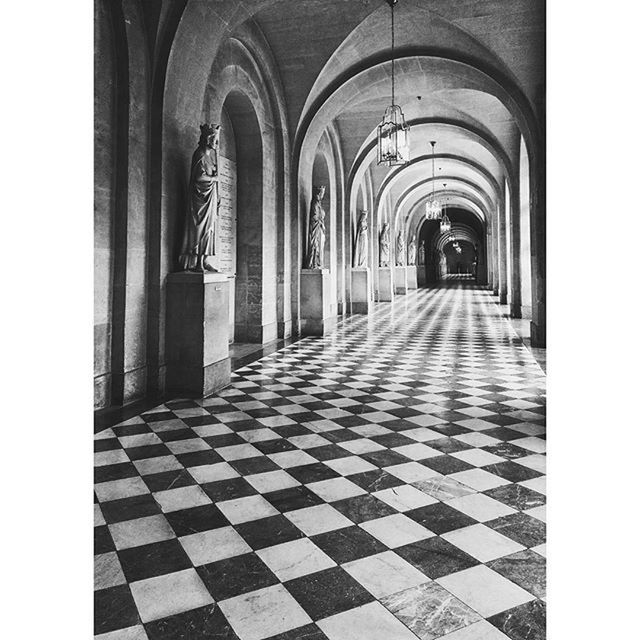 indoors, arch, architecture, the way forward, built structure, corridor, tiled floor, transfer print, diminishing perspective, empty, flooring, auto post production filter, in a row, day, absence, cobblestone, place of worship, vanishing point, walkway, entrance