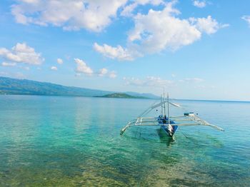 Boat sailing in sea