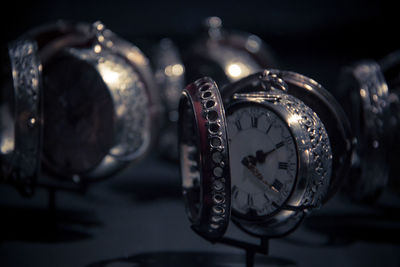 Close-up of pocket watch on table