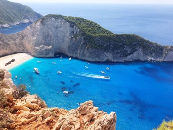 High angle view of rocks by sea