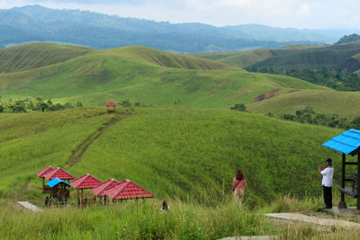 Scenic view of field and mountains