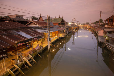 Boats moored at harbor