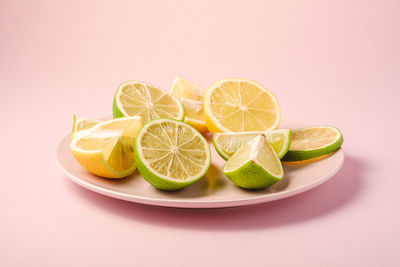 Close-up of fruits against white background