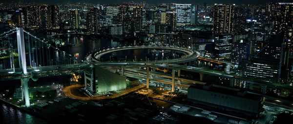 High angle view of illuminated bridge and buildings in city at night,tokyo,japan