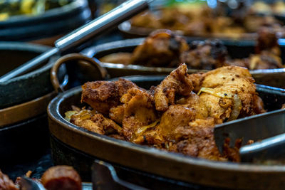 Close-up of meat on barbecue grill