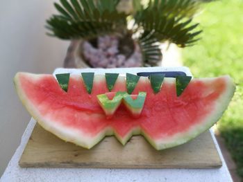 Close-up of carved watermelon on retaining wall