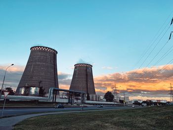 Low angle view of factory against sky