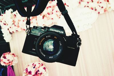 Close-up of camera on table