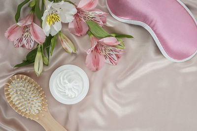 High angle view of pink roses on table