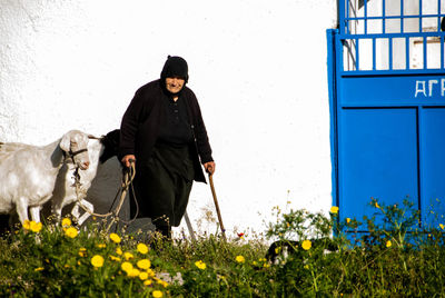 Woman standing on field