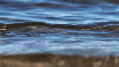 Close-up of sea waves against sky