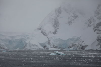 Scenic view of snowcapped mountains