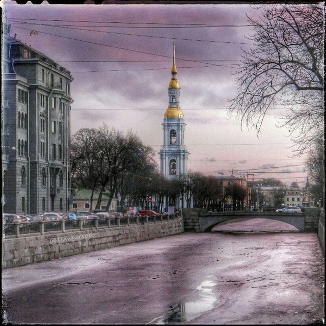 architecture, building exterior, built structure, sky, tree, road, tower, street, cloud - sky, bare tree, the way forward, religion, church, city, travel destinations, cloudy, transportation, cloud, auto post production filter, famous place