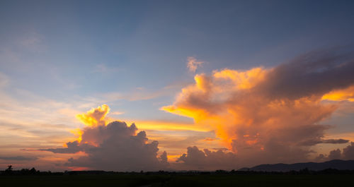 Scenic view of dramatic sky during sunset