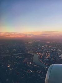 Aerial view of cityscape against sky