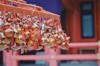 Close-up of decoration hanging outdoors for sale