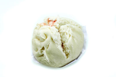 Close-up of ice cream over white background