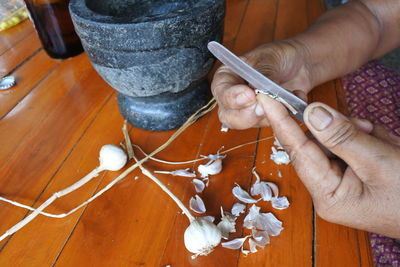 High angle view of woman working on table