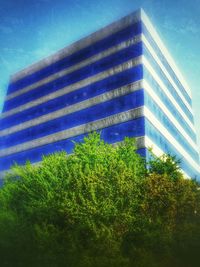 Low angle view of modern building against sky