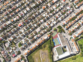 High angle view of buildings and street in city