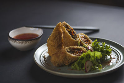 Close-up of served food in plate