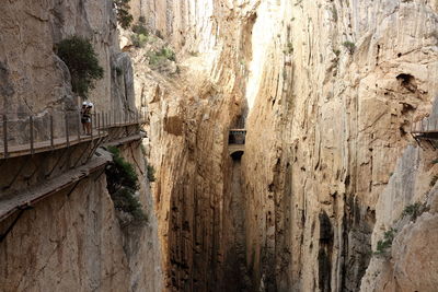 Wooden pathway by mountain