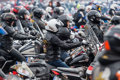 People riding motorcycle on street