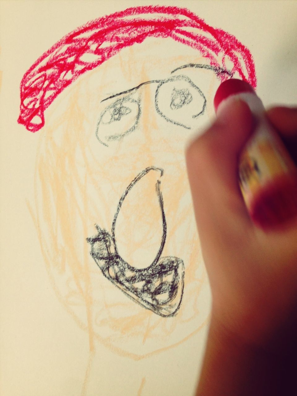indoors, person, close-up, holding, creativity, art and craft, art, lifestyles, part of, leisure activity, human finger, communication, text, cropped, studio shot, human representation