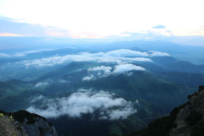 Aerial view of mountains against sky