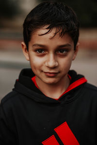 Close-up portrait of boy smiling